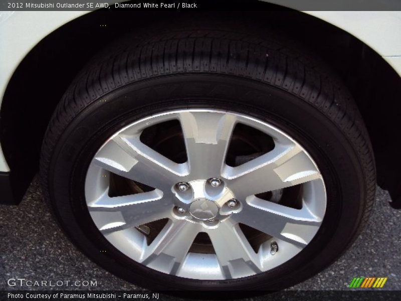Diamond White Pearl / Black 2012 Mitsubishi Outlander SE AWD