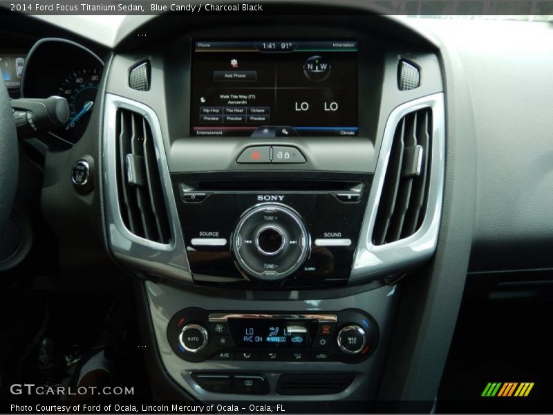 Blue Candy / Charcoal Black 2014 Ford Focus Titanium Sedan