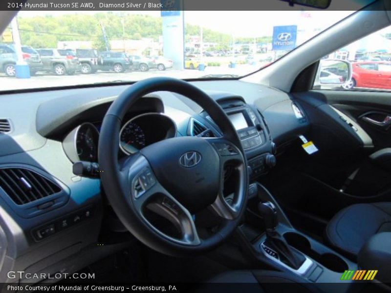 Diamond Silver / Black 2014 Hyundai Tucson SE AWD
