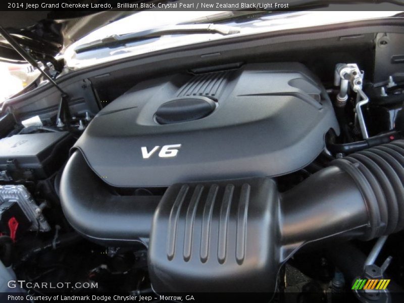 Brilliant Black Crystal Pearl / New Zealand Black/Light Frost 2014 Jeep Grand Cherokee Laredo