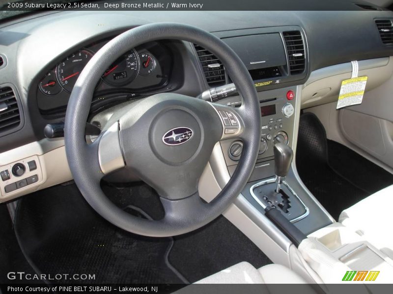 Deep Bronze Metallic / Warm Ivory 2009 Subaru Legacy 2.5i Sedan