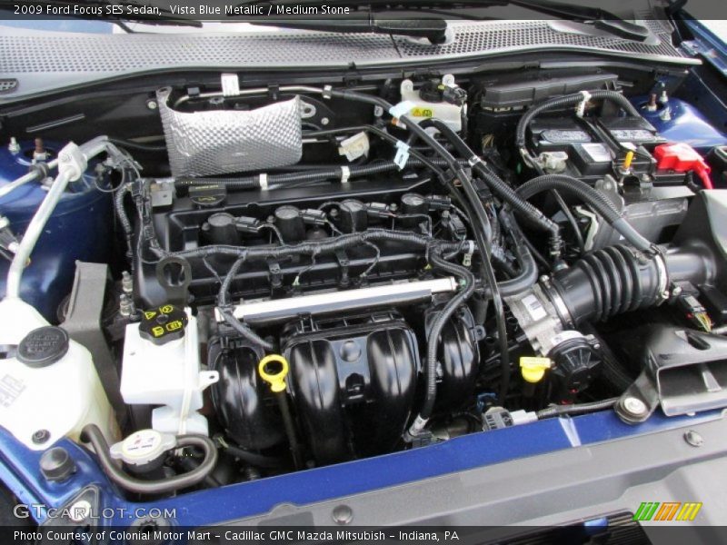 Vista Blue Metallic / Medium Stone 2009 Ford Focus SES Sedan
