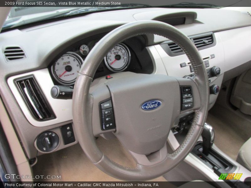 Vista Blue Metallic / Medium Stone 2009 Ford Focus SES Sedan