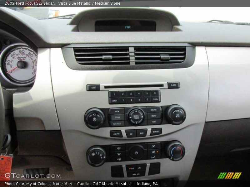 Vista Blue Metallic / Medium Stone 2009 Ford Focus SES Sedan
