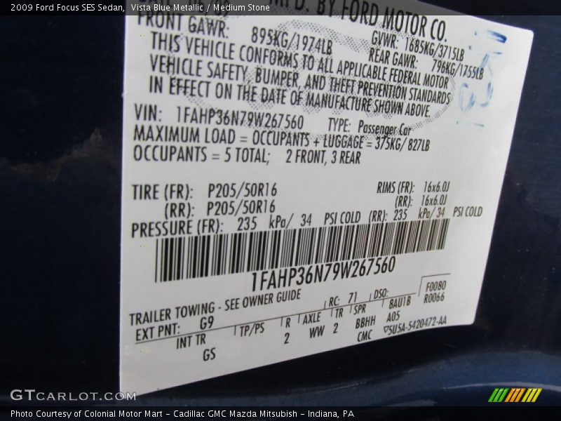 Vista Blue Metallic / Medium Stone 2009 Ford Focus SES Sedan
