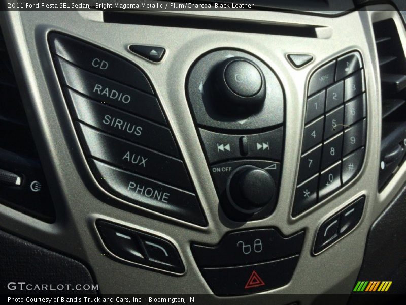 Bright Magenta Metallic / Plum/Charcoal Black Leather 2011 Ford Fiesta SEL Sedan