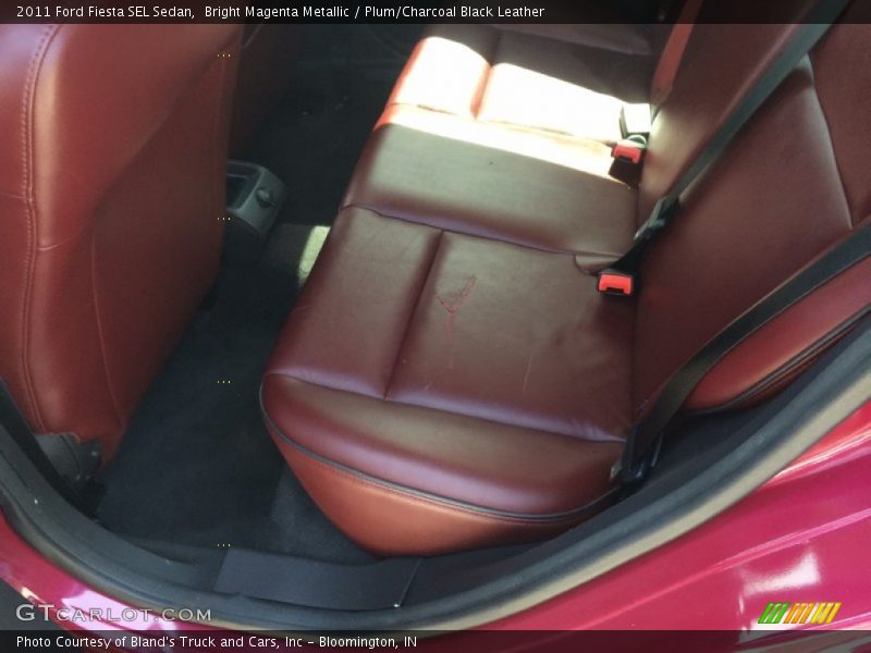 Bright Magenta Metallic / Plum/Charcoal Black Leather 2011 Ford Fiesta SEL Sedan