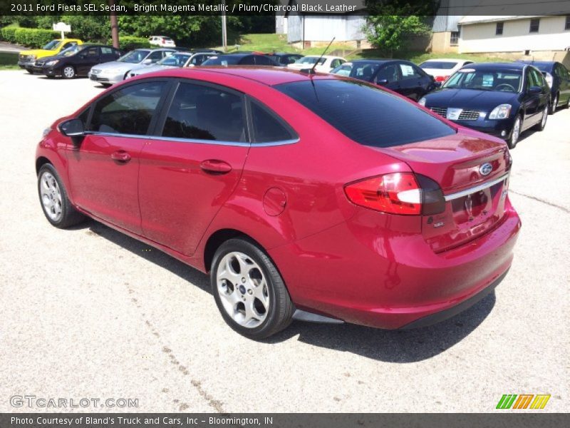 Bright Magenta Metallic / Plum/Charcoal Black Leather 2011 Ford Fiesta SEL Sedan