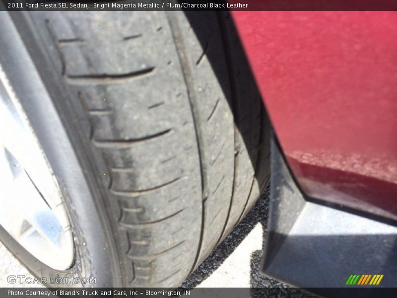 Bright Magenta Metallic / Plum/Charcoal Black Leather 2011 Ford Fiesta SEL Sedan