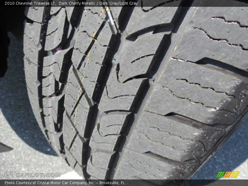 Dark Cherry Metallic / Dark Gray/Light Gray 2010 Chevrolet Traverse LT