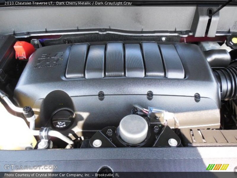 Dark Cherry Metallic / Dark Gray/Light Gray 2010 Chevrolet Traverse LT