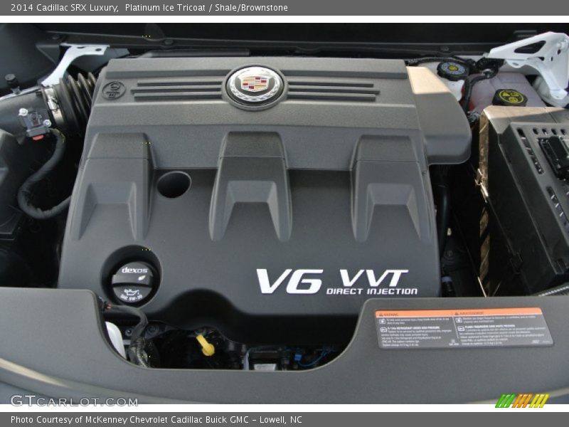 Platinum Ice Tricoat / Shale/Brownstone 2014 Cadillac SRX Luxury