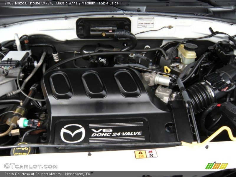 Classic White / Medium Pebble Beige 2003 Mazda Tribute LX-V6