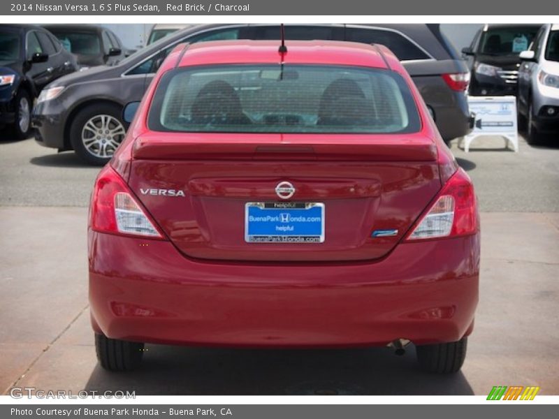Red Brick / Charcoal 2014 Nissan Versa 1.6 S Plus Sedan
