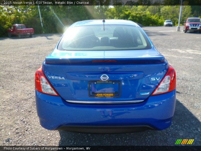 Metallic Blue / Charcoal 2015 Nissan Versa 1.6 SV Sedan