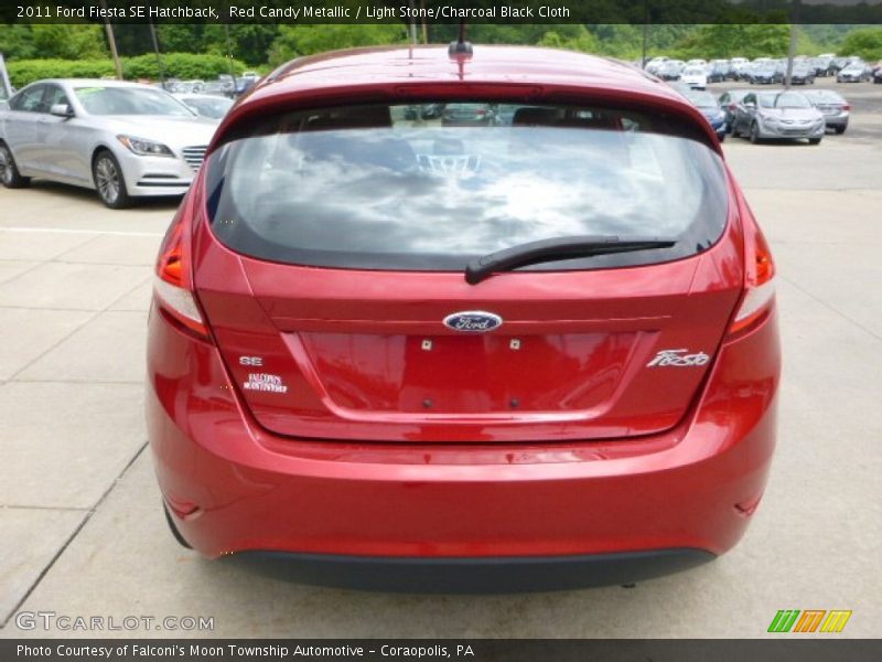 Red Candy Metallic / Light Stone/Charcoal Black Cloth 2011 Ford Fiesta SE Hatchback