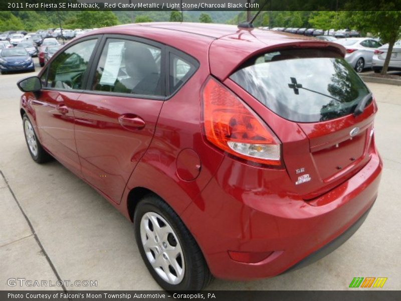 Red Candy Metallic / Light Stone/Charcoal Black Cloth 2011 Ford Fiesta SE Hatchback