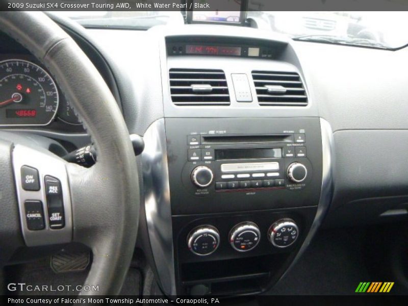 White Water Pearl / Black 2009 Suzuki SX4 Crossover Touring AWD
