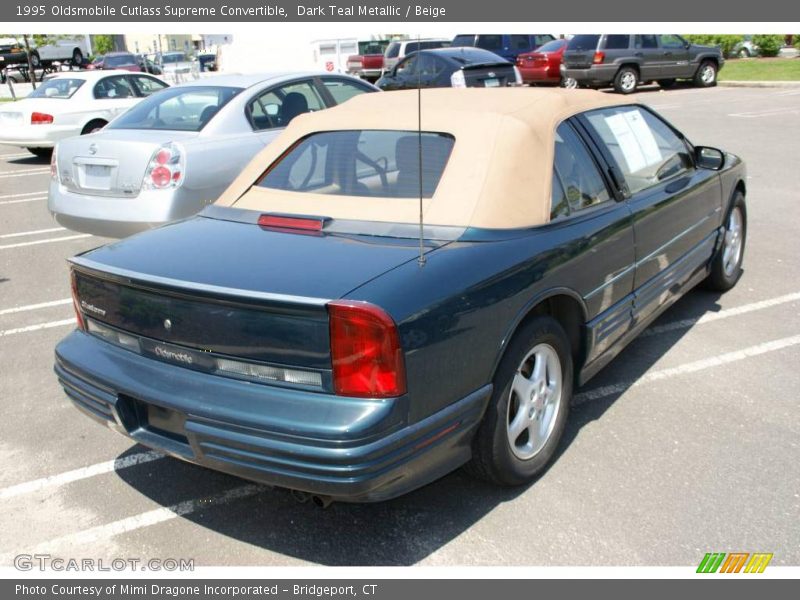 Dark Teal Metallic / Beige 1995 Oldsmobile Cutlass Supreme Convertible