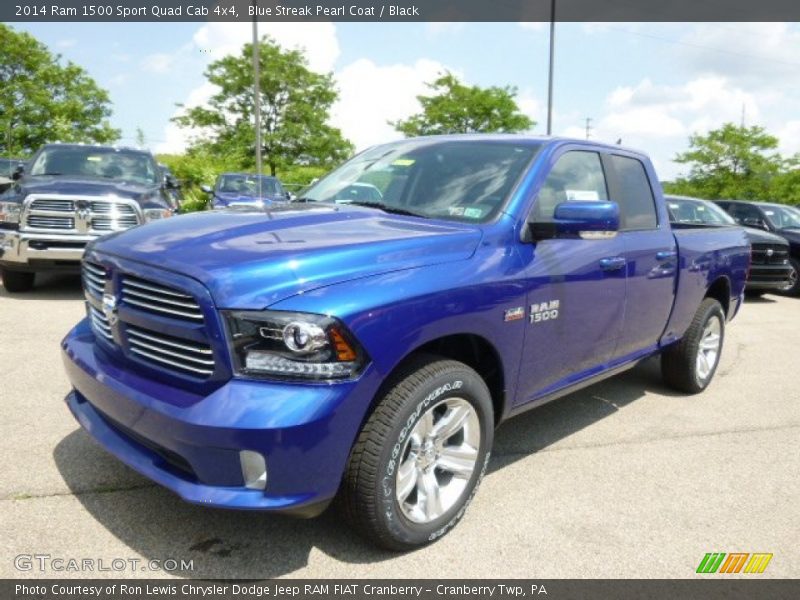 Front 3/4 View of 2014 1500 Sport Quad Cab 4x4