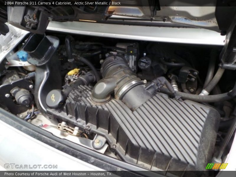 Arctic Silver Metallic / Black 2004 Porsche 911 Carrera 4 Cabriolet