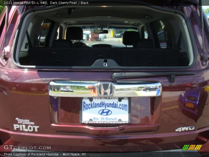 Dark Cherry Pearl / Black 2011 Honda Pilot EX-L 4WD