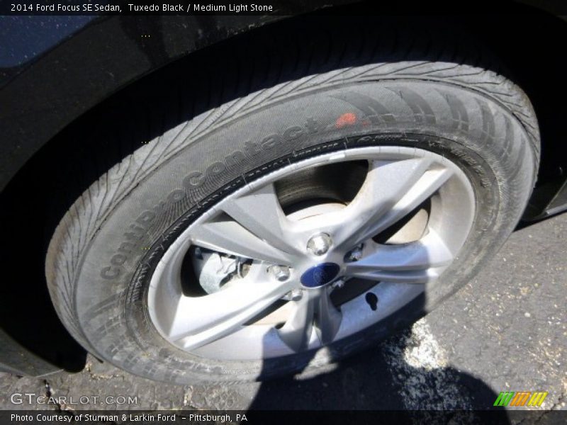 Tuxedo Black / Medium Light Stone 2014 Ford Focus SE Sedan