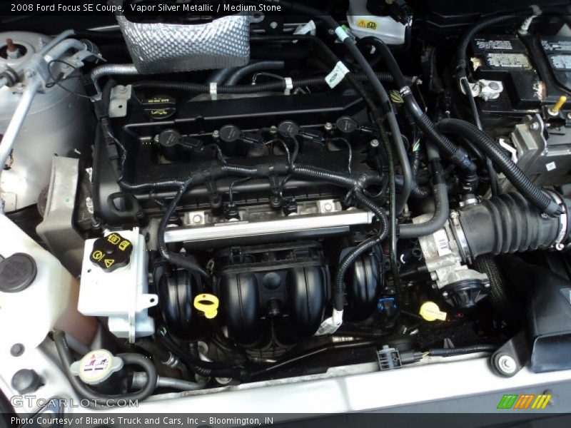 Vapor Silver Metallic / Medium Stone 2008 Ford Focus SE Coupe