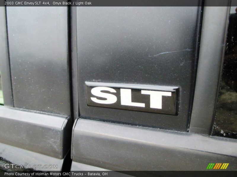  2003 Envoy SLT 4x4 Logo