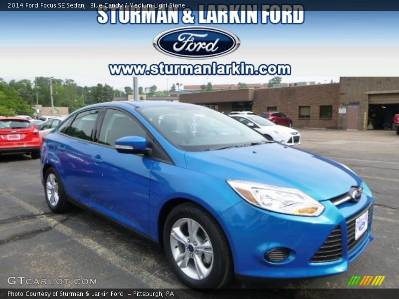 Blue Candy / Medium Light Stone 2014 Ford Focus SE Sedan