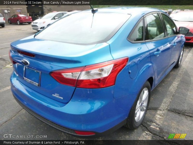 Blue Candy / Medium Light Stone 2014 Ford Focus SE Sedan