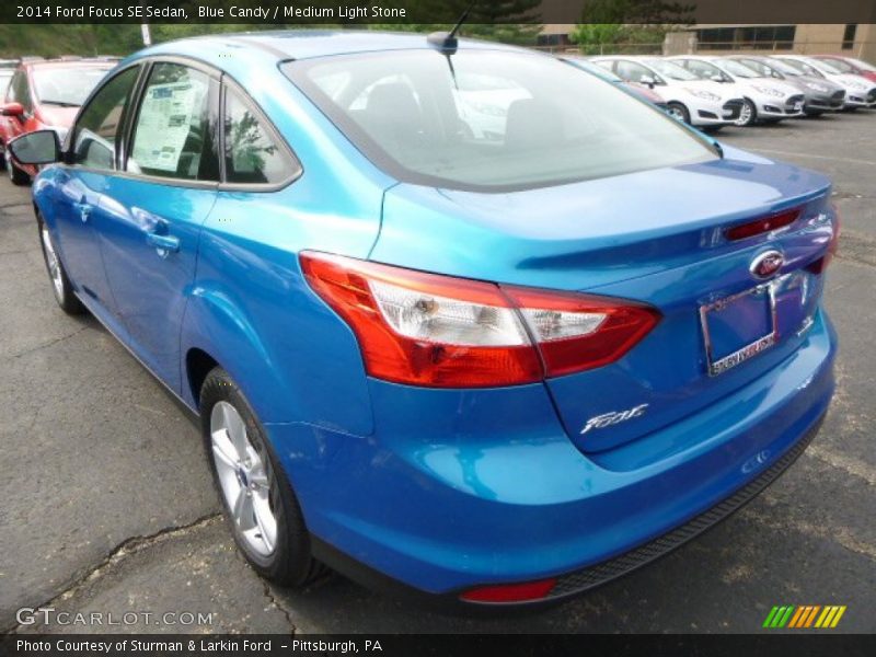 Blue Candy / Medium Light Stone 2014 Ford Focus SE Sedan