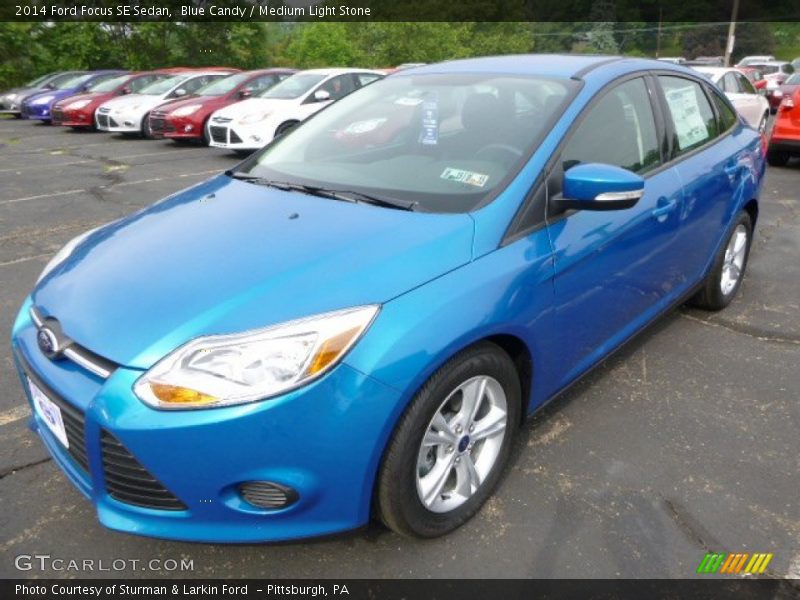 Blue Candy / Medium Light Stone 2014 Ford Focus SE Sedan
