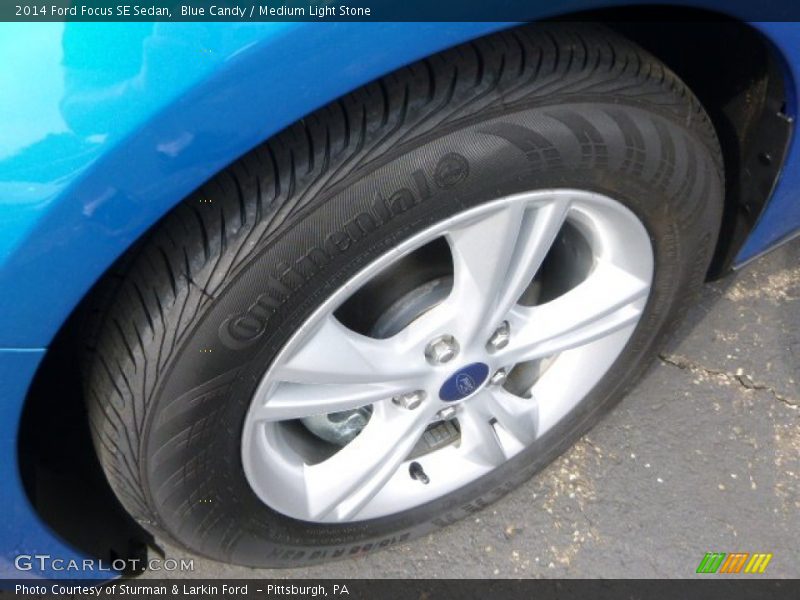 Blue Candy / Medium Light Stone 2014 Ford Focus SE Sedan