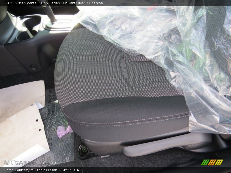 Brilliant Silver / Charcoal 2015 Nissan Versa 1.6 SV Sedan