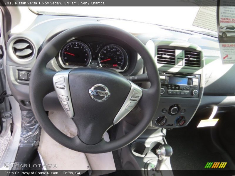 Brilliant Silver / Charcoal 2015 Nissan Versa 1.6 SV Sedan