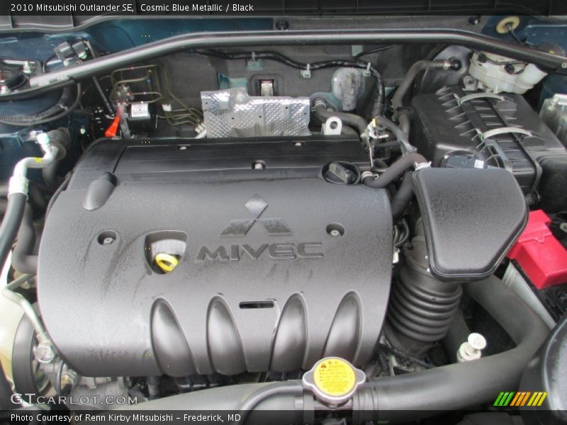 Cosmic Blue Metallic / Black 2010 Mitsubishi Outlander SE