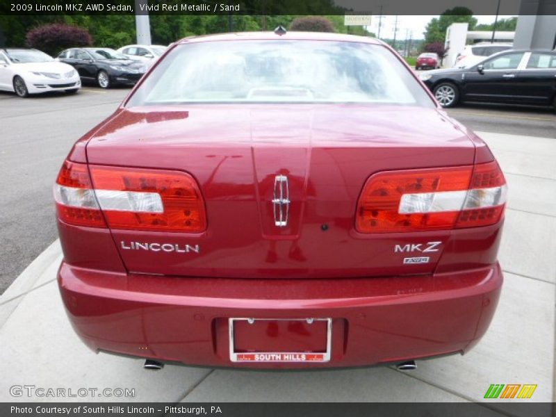 Vivid Red Metallic / Sand 2009 Lincoln MKZ AWD Sedan