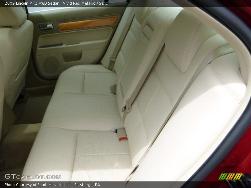 Vivid Red Metallic / Sand 2009 Lincoln MKZ AWD Sedan