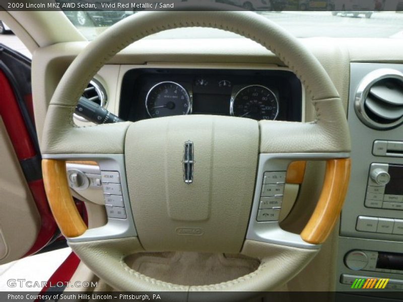 Vivid Red Metallic / Sand 2009 Lincoln MKZ AWD Sedan