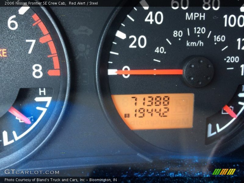 Red Alert / Steel 2006 Nissan Frontier SE Crew Cab
