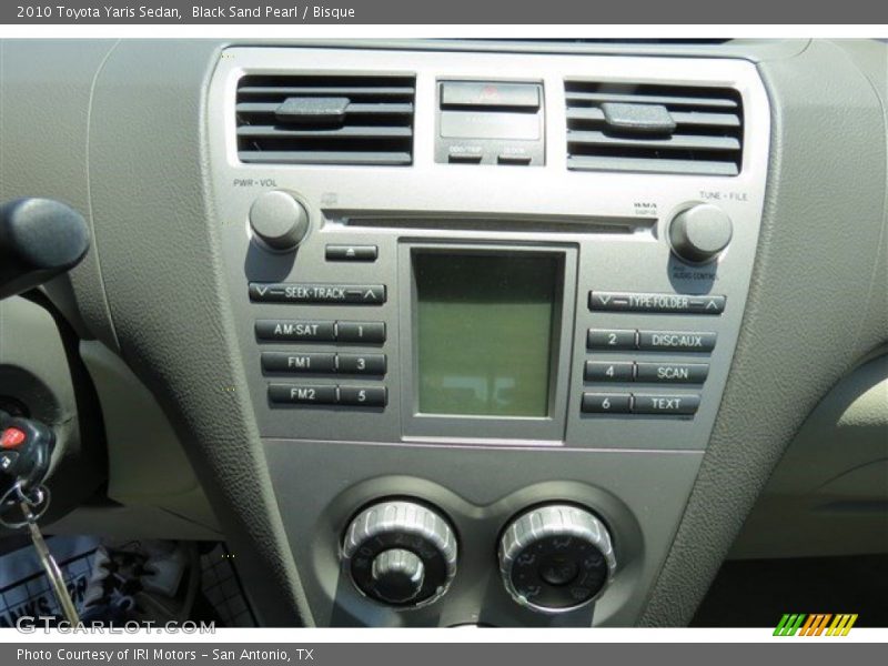 Black Sand Pearl / Bisque 2010 Toyota Yaris Sedan