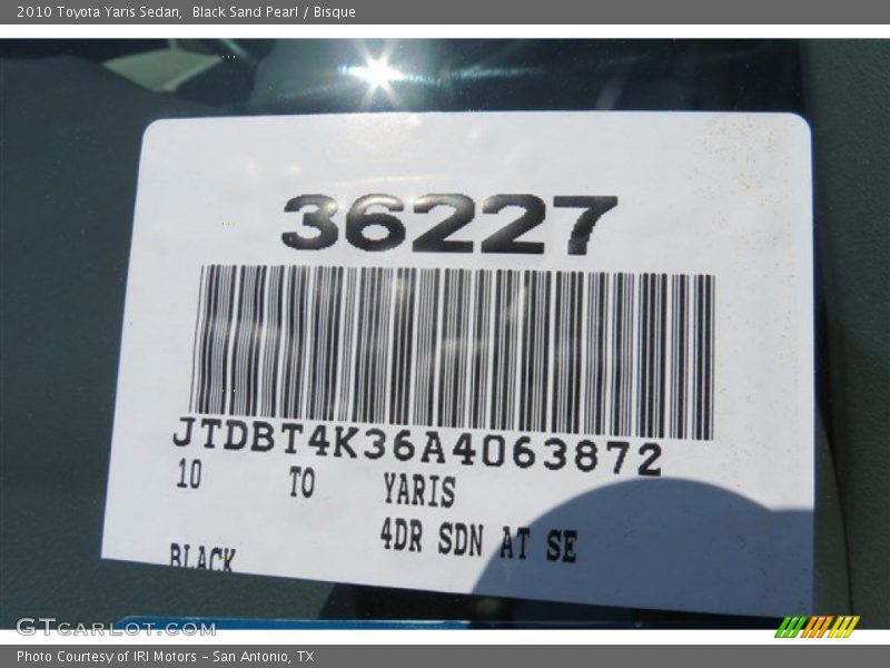Black Sand Pearl / Bisque 2010 Toyota Yaris Sedan