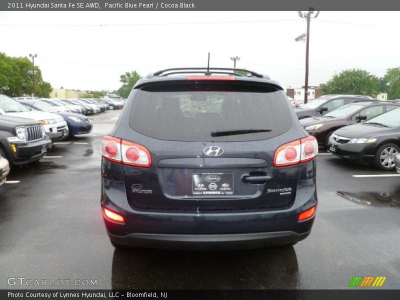 Pacific Blue Pearl / Cocoa Black 2011 Hyundai Santa Fe SE AWD