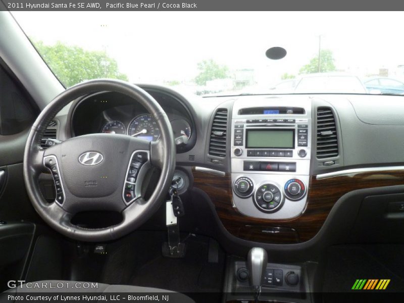 Pacific Blue Pearl / Cocoa Black 2011 Hyundai Santa Fe SE AWD