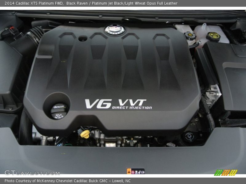 Black Raven / Platinum Jet Black/Light Wheat Opus Full Leather 2014 Cadillac XTS Platinum FWD