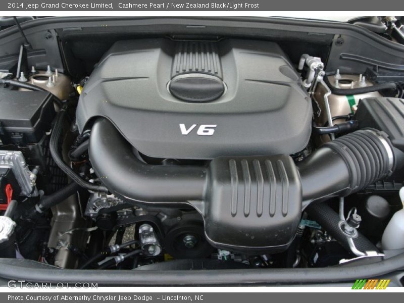 Cashmere Pearl / New Zealand Black/Light Frost 2014 Jeep Grand Cherokee Limited