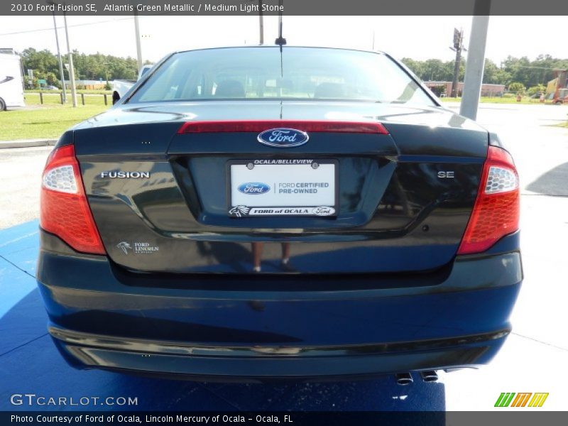 Atlantis Green Metallic / Medium Light Stone 2010 Ford Fusion SE