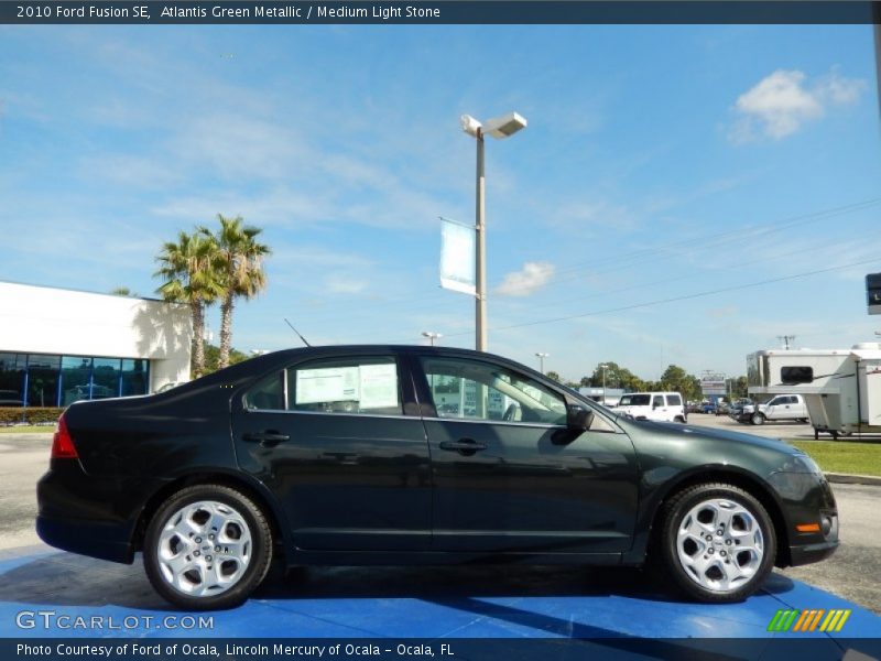 Atlantis Green Metallic / Medium Light Stone 2010 Ford Fusion SE