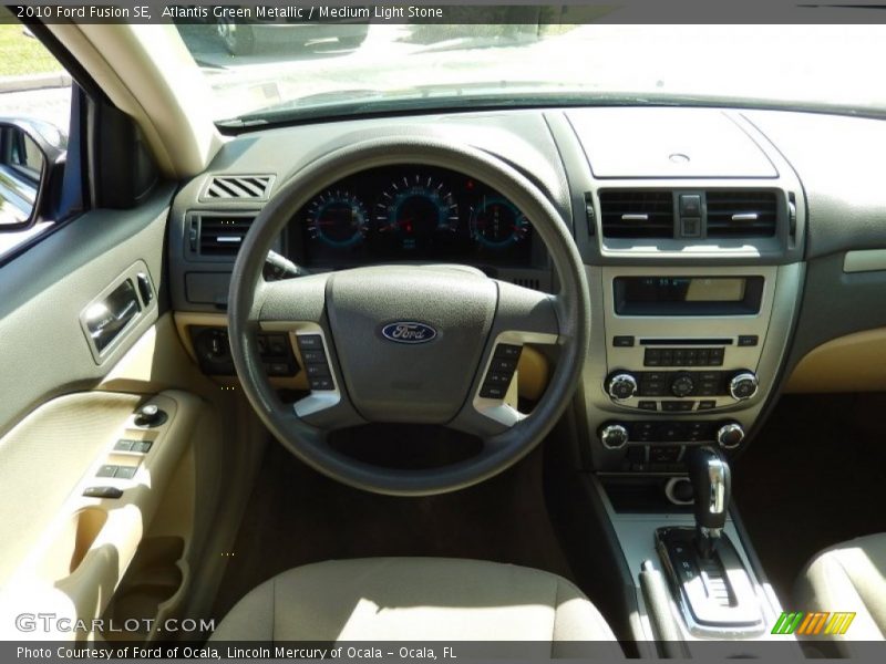 Atlantis Green Metallic / Medium Light Stone 2010 Ford Fusion SE